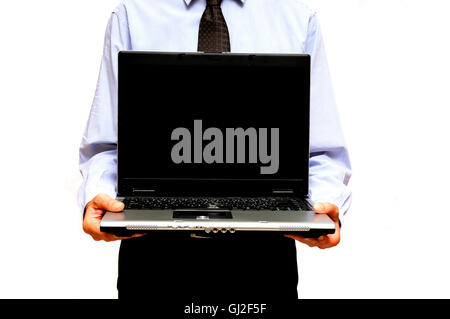 businessman showing a laptop with blank screen Stock Photo