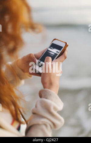 Woman using mobile phone Stock Photo