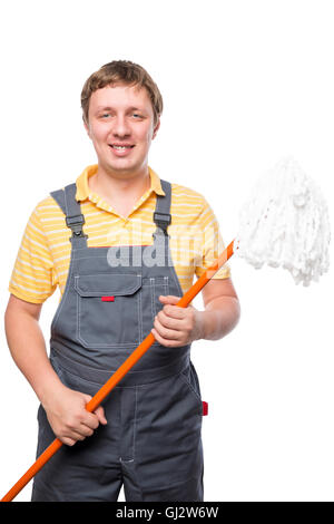 happy man in overalls holding a mop on a white background isolated Stock Photo