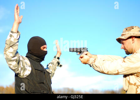 soldier aiming terrorist Stock Photo