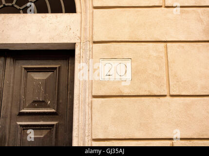 Engraved building number in Rome Stock Photo - Alamy
