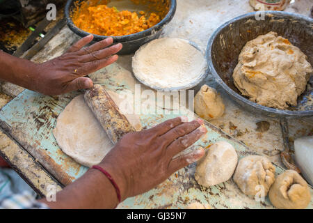 Traditional way of making indian parantha on street sell stall in Jaisalmer, India Stock Photo