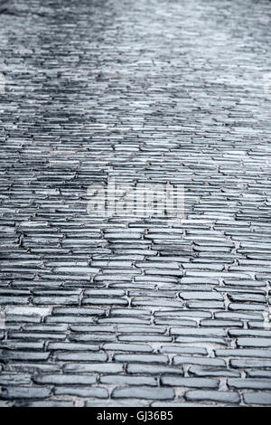 Wet ancient cobblestone floor detail for background Stock Photo - Alamy