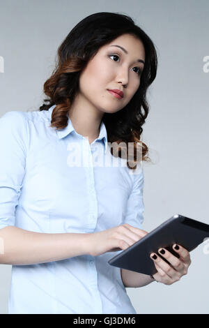 Woman with tablet Stock Photo