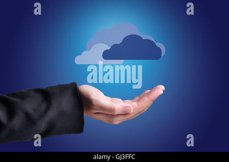 Hand with clouds over them. Cloud computing concept. Stock Photo