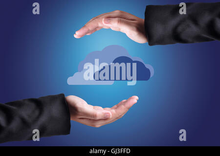 Hand with clouds over them. Cloud computing concept. Stock Photo
