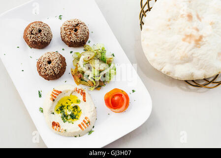 falafel hummus houmus starter snack middle eastern food mezze platter Stock Photo