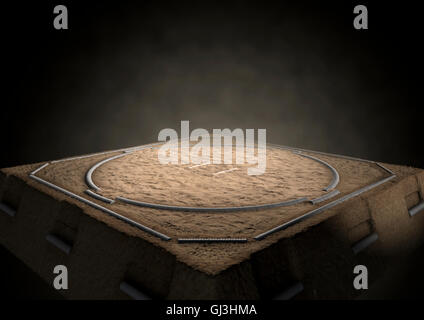 A 3D render of an empty traditional sumo wrestling ring made with sand dimly lit by spotlights on a dark background Stock Photo