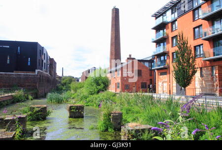 Apartments (r) overlooking the River Don looking to industrial heritage landmarks in Kelham Island area of City of Sheffield, UK Stock Photo