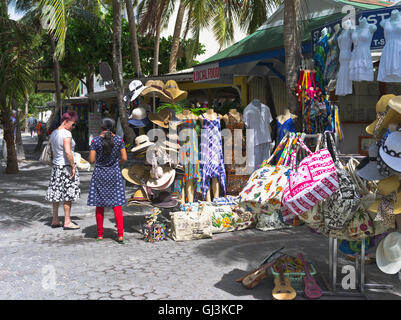 dh Philipsburg west indies ST MAARTEN CARIBBEAN Tourist woman shopping for souvenir hats shop stalls market saint Maartens shops Stock Photo