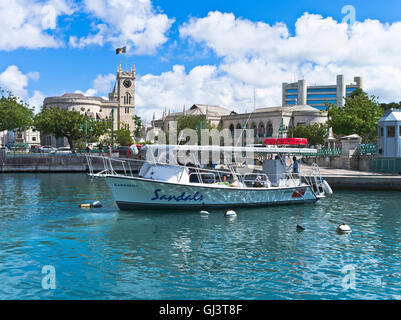 dh Bridgetown Careenage anchorage BARBADOS CARIBBEAN Tourist excursion boat harbour Parliament building tour west indies Stock Photo