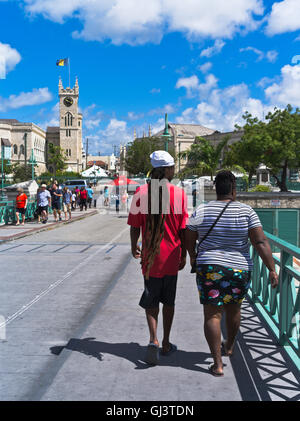 dh Bridgetown BARBADOS CARIBBEAN Dreadlocks hair Caribbean couple  Chamberlain Bridge pedestrian people Stock Photo