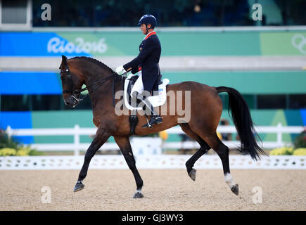 Great Britain's Carl Hester riding Nip Tuck during the Dressage Team Grand Prix at the Olympic Equestrian Centre on the seventh day of the Rio Olympic Games, Brazil. Stock Photo