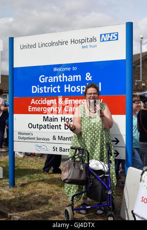 Grantham, Lincolnshire, UK. 13th Aug, 2016. The people of Grantham held a protest rally outside the hospital entrance on Manthorpe road today at 12.00am .To show the town's strength of feeling against the night-time closure of the A&E department from Wednesday next week. United Lincolnshire NHS hospitals trust say they are closing Grantham A&E due a staffing crisis at Lincoln county, and Boston pilgrim hospitals. Credit:  Ian Francis/Alamy Live News Stock Photo