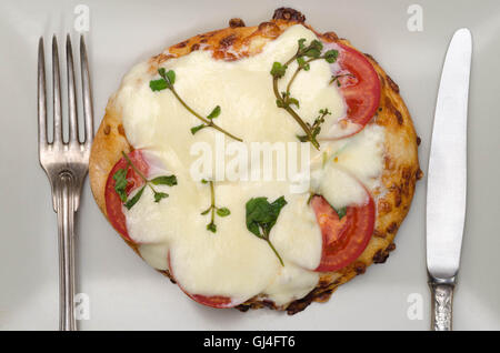 Italian homemade mini pizza on plate Stock Photo