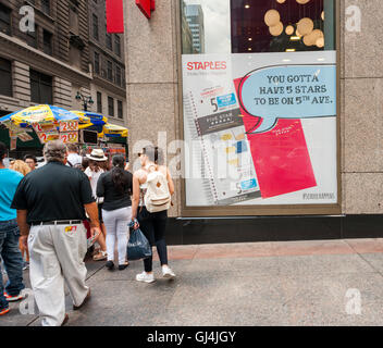 A back to school display is seen on the window of a Staples store in New York on Friday, August 5, 2016. Back-to-school is the second biggest shopping season. (© Richard B. Levine) Stock Photo