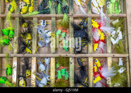 Selection of fly fishing lures, or flies, for sale in a sportsman shop in downtown Sylva, North Carolina Stock Photo