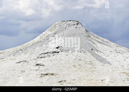 Mud volcanoes also known as mud domes erupting in summer landscape Stock Photo