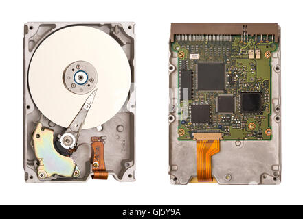 Hdd isolated on white background. Two sides of the hard disk. Computer chips. Inside of internal Harddrive. Stock Photo