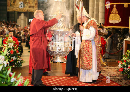 Service on July 25th, on St James Day at the altar of Santiago de Compostela Cathedral. Interior,Putting incense into the Botafumeiro, Stock Photo