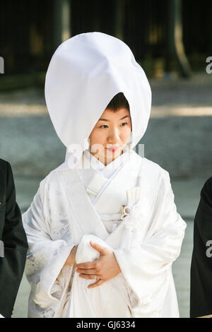 After the traditional Japanese Shinto wedding ceremony a formal portrait sitting takes place, at Meiji Jingu Shrine; near Haraju Stock Photo