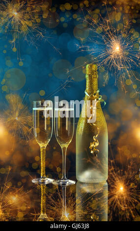 Two champagne glasses ready to bring in the New Year Stock Photo - Alamy
