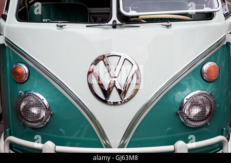 Teal colour classic retro Volkswagen split screen camper van close up front view. Stock Photo
