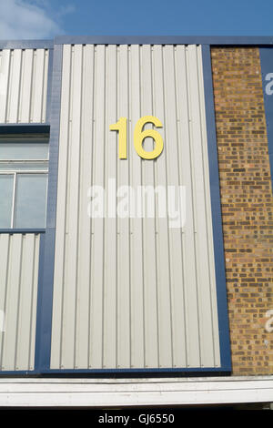 Factory unit number 16 sign Stock Photo - Alamy