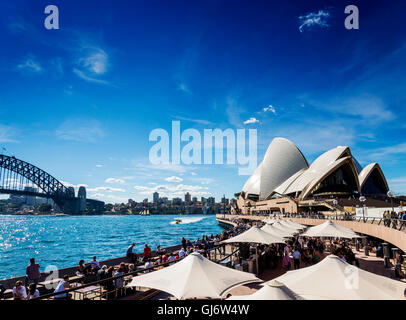sydney opera house famous landmark and waterside cafe restaurant promenade in australia Stock Photo