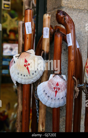 Pilgrim staff's,walking sticks,with,shell,symbol,of, for sale at this tourist shop in the Old Town of Santiago de Compestela. The scallop shell is th Stock Photo