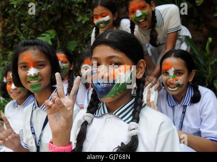 Allahabad, India. 13th Aug, 2016. Allahabad: Girls with tricolor on their face smiles ahead of Independence Day celebration in Allahabad on 13-08-2016. photo by prabhat kumar verma Credit:  Prabhat Kumar Verma/Pacific Press/Alamy Live News Stock Photo