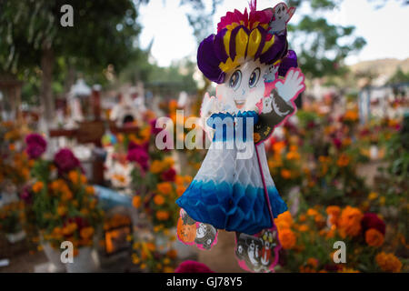 Day of the dead,decoration of graves at  San Miguel cemetary, Oaxaca, Mexico Stock Photo