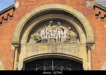 Smithfield old fish Markets sculpted figures,Manchester city centre, England,UK Stock Photo