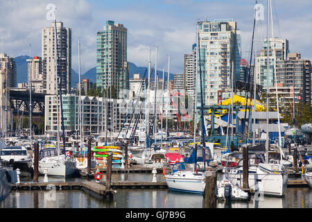 Marina in False Creek with the skyline of the Yaletown district of Vancouver as a backdrop Stock Photo