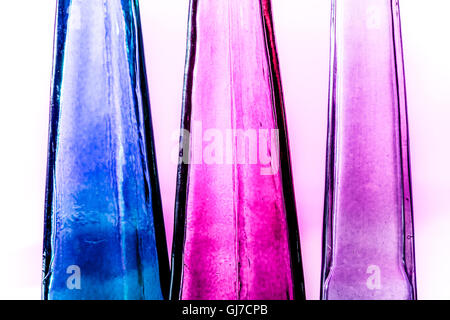 Colored glass bottles Cutouts on Light table. Stock Photo