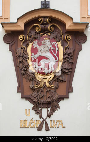 Bohemian heraldic lion depicted on the House at the White Lion in Celetna Street in the Old Town in Prague, Czech Republic. Stock Photo