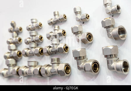 Set of pipe fittings and fixturing components Stock Photo