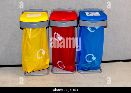 Three colourful recycling bins concept picture at a commercial premises Stock Photo