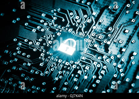 Lock on computer chip Stock Photo