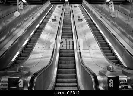 Escalators at Tottenham Court Road London Underground station leading ...