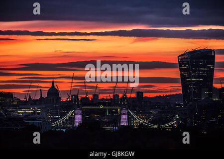 London, UK. 13th August, 2016. UK Weather, stunning sunset even as pollution threatens. Dramatic evening light over St. Paul’s Cathedral and Tower Bridge in central London Credit:  Guy Corbishley/Alamy Live News Stock Photo