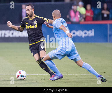 Columbus, U.S.A. 13th Aug, 2016. August 13, 2016: Columbus Crew SC forward Justin Meram (9) goes one on one with New York City FC forward Tony Taylor (99) in the first half. Columbus, OH, USA. (Brent Clark/Alamy Live News) Stock Photo