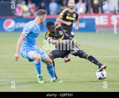 Columbus, U.S.A. 13th Aug, 2016. August 13, 2016: Columbus Crew SC defender Waylon Francis (14) handles the ball against New York City FC defender Frederic Brillant (13).Columbus, OH, USA. (Brent Clark/Alamy Live News) Stock Photo