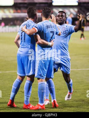 Columbus, U.S.A. 13th Aug, 2016. August 13, 2016: New York City FC forward David Villa (7) is congratulated after scoring a goal by his team mates New York City FC midfielder Jack Harrison (11) and New York City FC forward Stiven Mendoza (9) in the second half. Columbus, OH, USA. (Brent Clark/Alamy Live News) Stock Photo