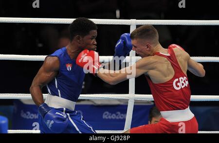 Pat McCormack (GBR, red) and Yasnier Toledo (CUB). Boxing. Riocentro 6. Olympic park. Rio de Janeiro. Brazil. 14/08/2016. Stock Photo