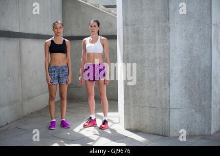MODEL RELEASED. Two young women in sports wear. Stock Photo