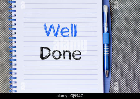 Well done text concept write on notebook Stock Photo