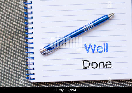 Well done text concept write on notebook Stock Photo