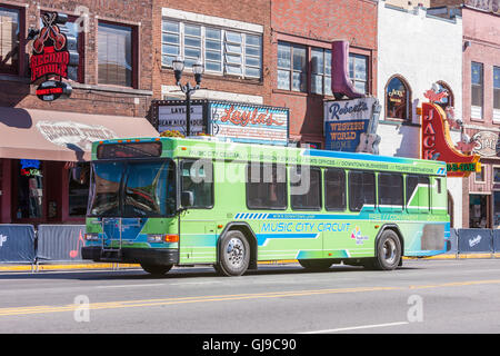 A free Music City Circuit circulator bus in the Honky Tonk District of Nashville, Tennessee. Stock Photo