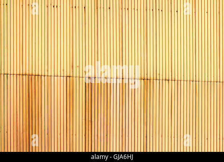 Grunge background with pale yellow paint on old rusty corrugated metal Stock Photo